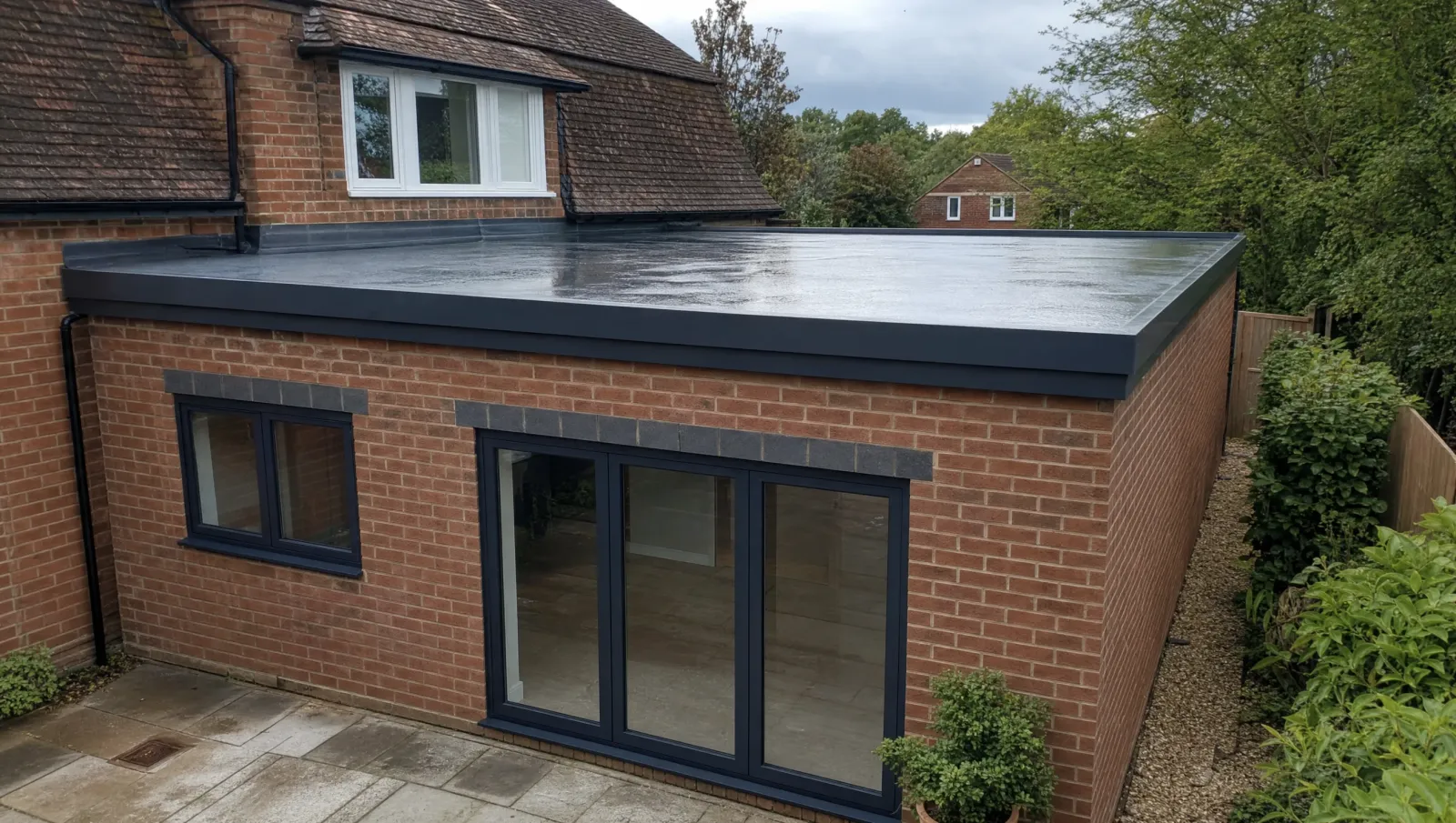 Contemporary single-storey extension with a finished flat roof